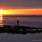 Angler am Strand