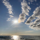 Sonne und Wolken